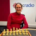 Morgen at a chess board in the CBC studio, Happy Valley-Goose Bay.